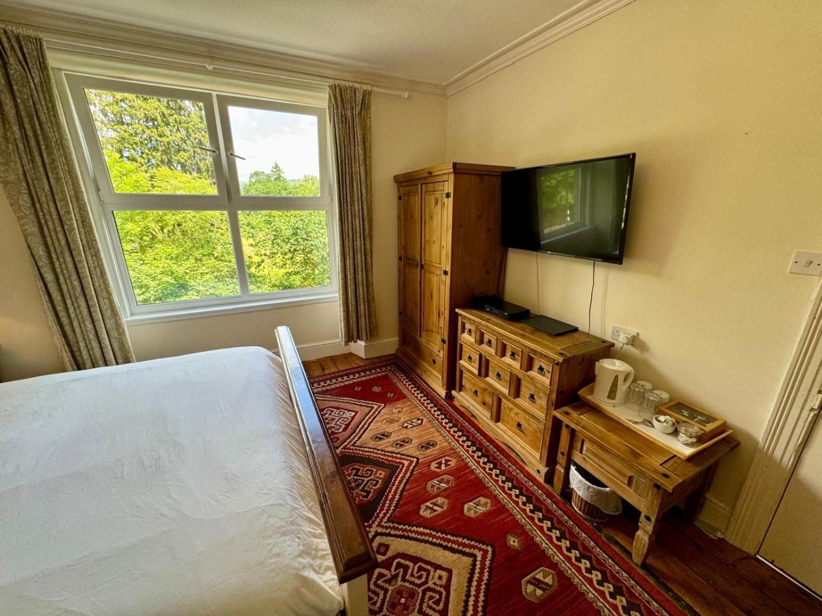 בטווס אי קואד Fairhaven Stay חדר תמונה